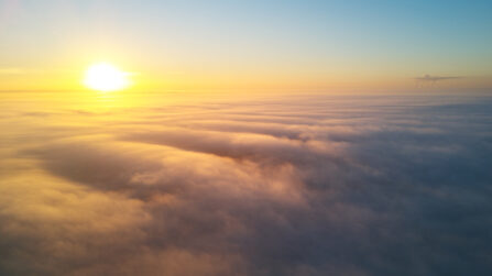 A view of the sun and clouds from above the clouds