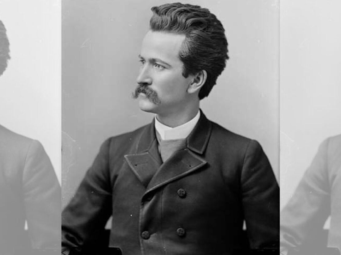 A profile portrait of Robert M. La Follette. His head and torso are visible and he is looking to the viewer's left. He wears a suit coat and has a serious expression on his face.