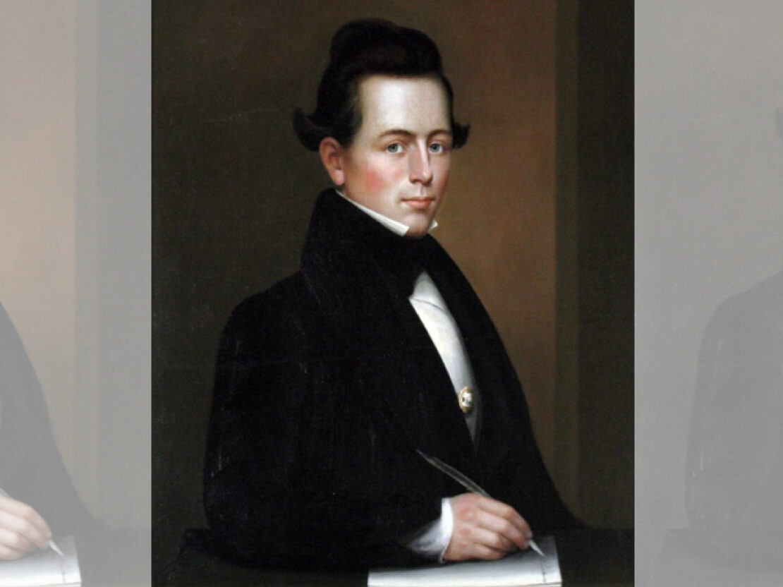 A painted portrait of a man. His head and torso are visible and he is looking directly at the viewer. He wears a formal suit. His right hand rests on a paper, and in it he holds a quill.