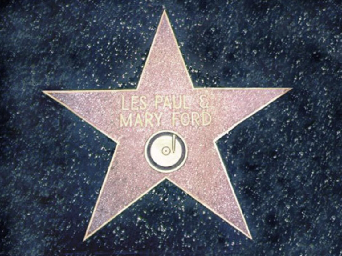A color photograph of a star with the words “Les Paul and Mary Ford” on it in gold, along with a musical note.