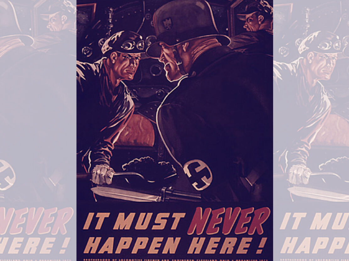 A color image of two men wearing uniforms and the text “It must never happen here!”