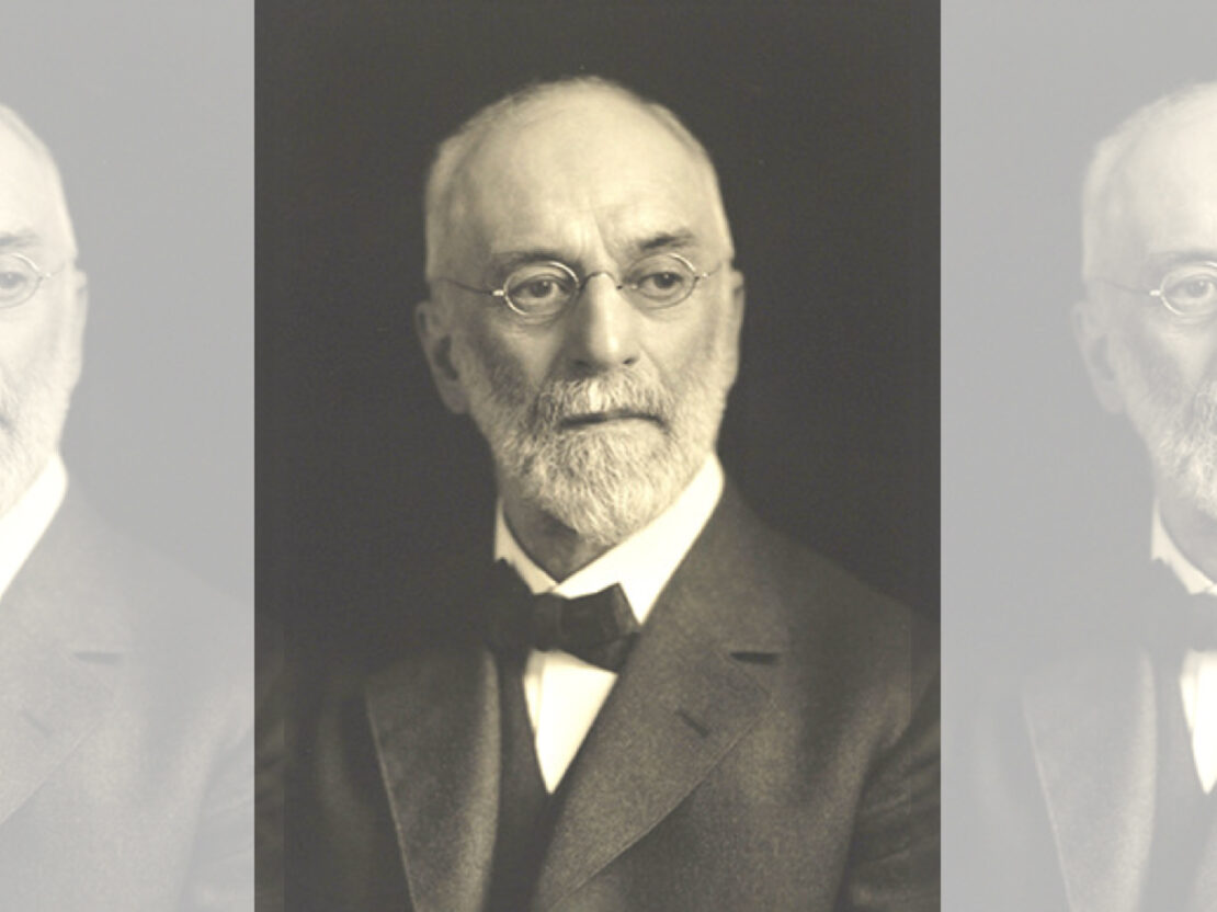 A black and white photograph of an older Stephen Babcock. He has a serious expression and looks to the right of the viewer.
