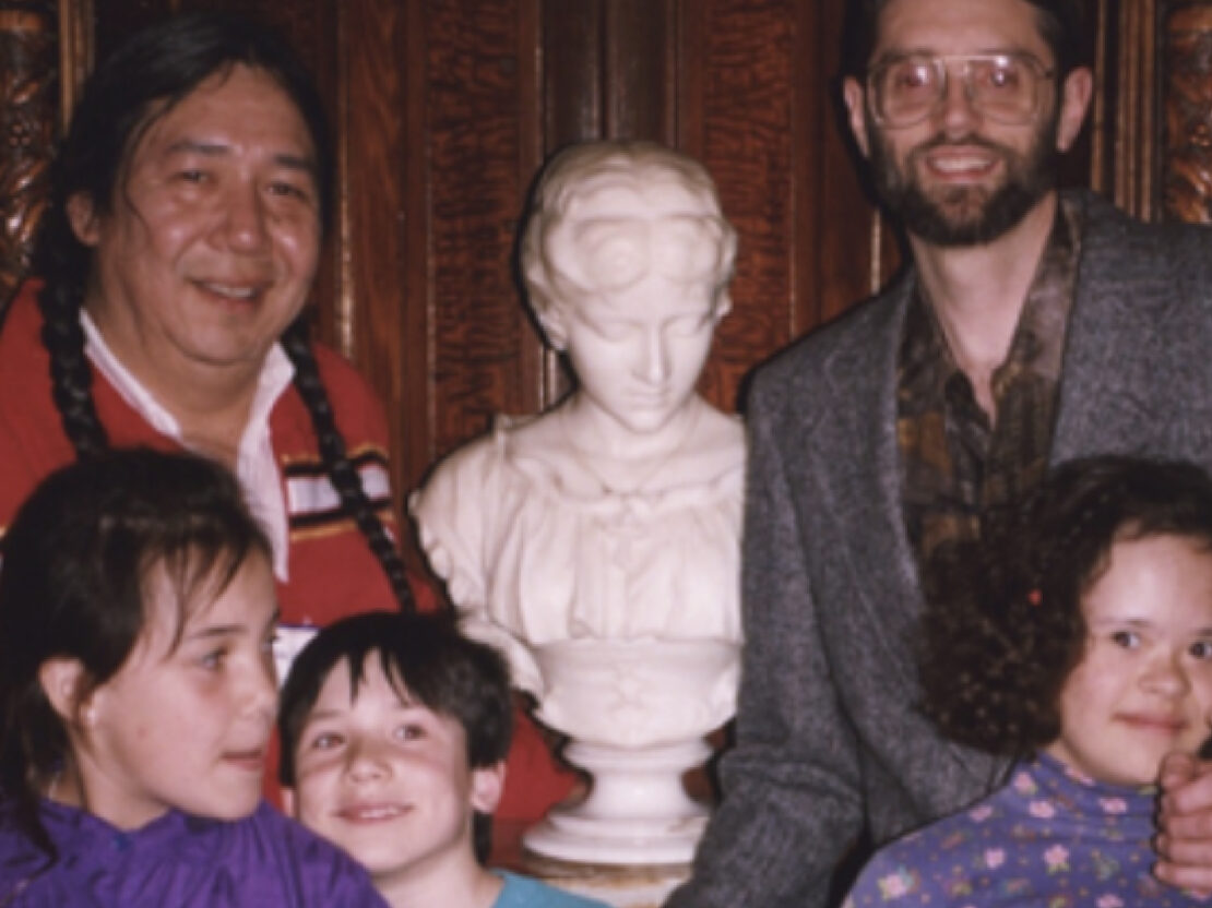 A color photograph of Walter, his three children and his friend, Rick Whaley.